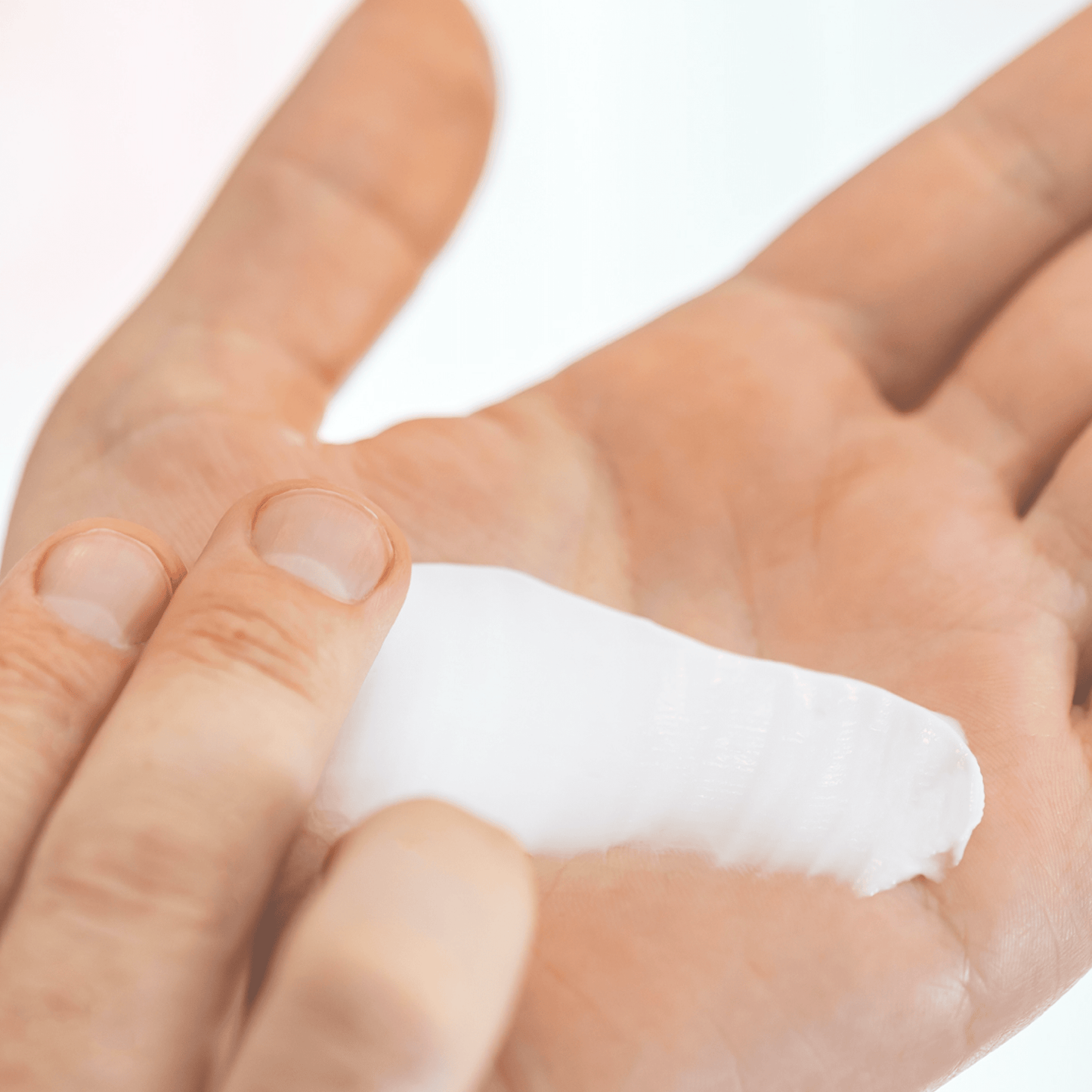 Dollar Shave Club Hand Cream in use.