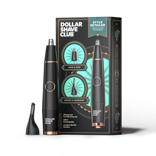 A photo of the Style Detailer with extra head next to its box on a transparent background