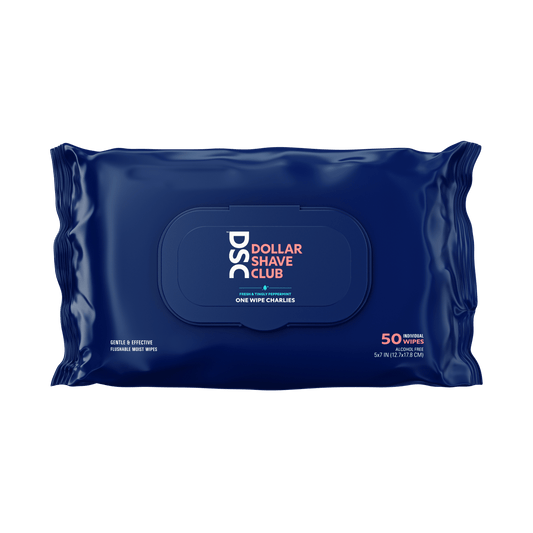 Dollar Shave Club One Wipe Charlies Butt Wipes against blank backdrop.